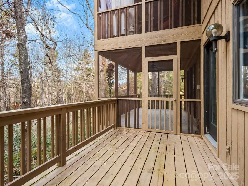 401 Scarlet Oak Lane, Hendersonville, NC 28791.  MLS# CAR4215612, YatesRealty ID 11677. Expansive Decks