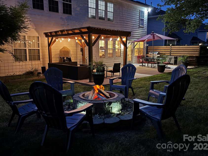 117 Middleton Place, Mooresville, NC 28117.  MLS# CAR4243590, YatesRealty ID 11681. Outdoor Living Space at Night