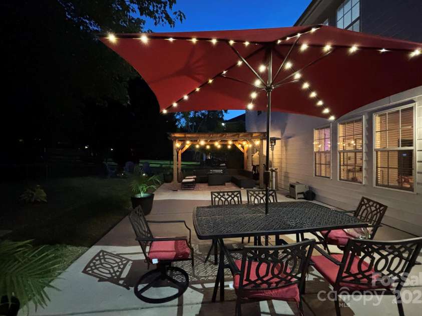 117 Middleton Place, Mooresville, NC 28117.  MLS# CAR4243590, YatesRealty ID 11681. Outdoor Living Space at Night