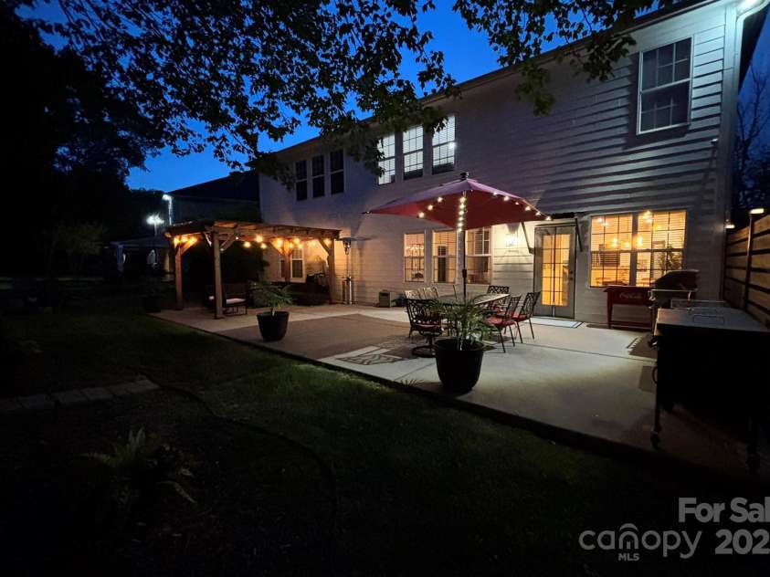 117 Middleton Place, Mooresville, NC 28117.  MLS# CAR4243590, YatesRealty ID 11681. Outdoor Living Space at Night