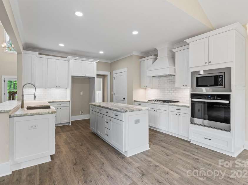 156 Clear Springs Road, Mooresville, NC 28115.  MLS# CAR4251662, YatesRealty ID 11684. Chef's kitchen with ample storage & prep space