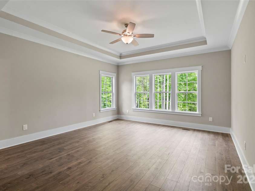 156 Clear Springs Road, Mooresville, NC 28115.  MLS# CAR4251662, YatesRealty ID 11684. Main floor master bedroom with his-&-hers walk-in closets