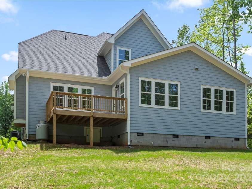 156 Clear Springs Road, Mooresville, NC 28115.  MLS# CAR4251662, YatesRealty ID 11684. Private back yard