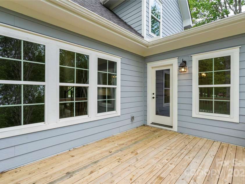 156 Clear Springs Road, Mooresville, NC 28115.  MLS# CAR4251662, YatesRealty ID 11684. Quiet back deck