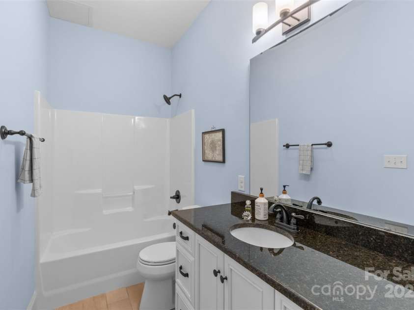 1655 Buckland Court, Indian Land, SC 29707.  MLS# CAR4252145, YatesRealty ID 11685. Downstairs bathroom