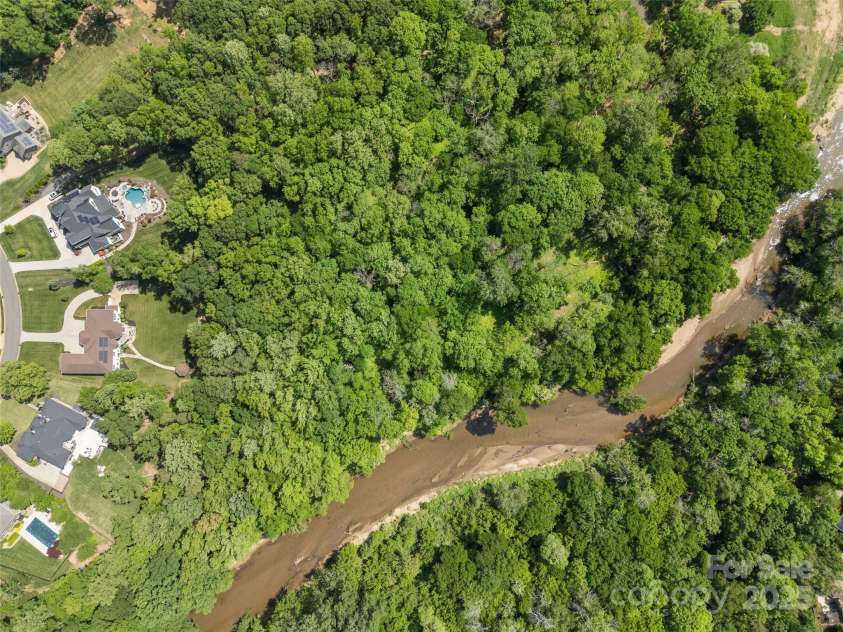 1655 Buckland Court, Indian Land, SC 29707.  MLS# CAR4252145, YatesRealty ID 11685. Huge 7 acre lot with Sugar Creek