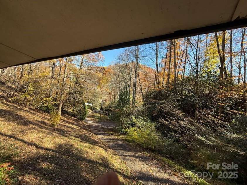 82 Merry Cove Road, Sylva, NC 28779.  MLS# CAR4322147, YatesRealty ID 1170. 