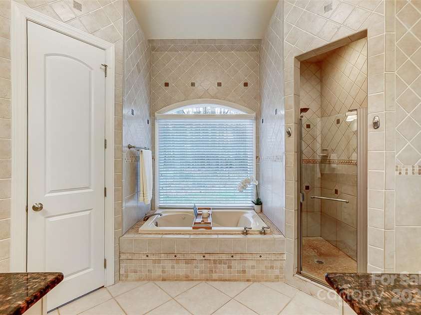 252 Bay Shore Loop, Mooresville, NC 28117.  MLS# CAR4218502, YatesRealty ID 11700. Owner's Bathroom