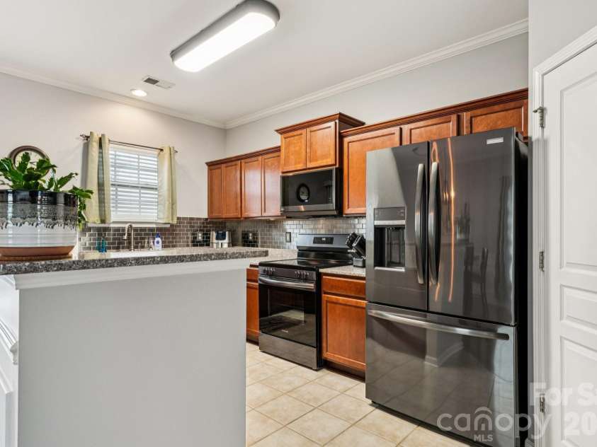 209 Halton Crossing Drive, Concord, NC 28027.  MLS# CAR4339937, YatesRealty ID 11702. 
