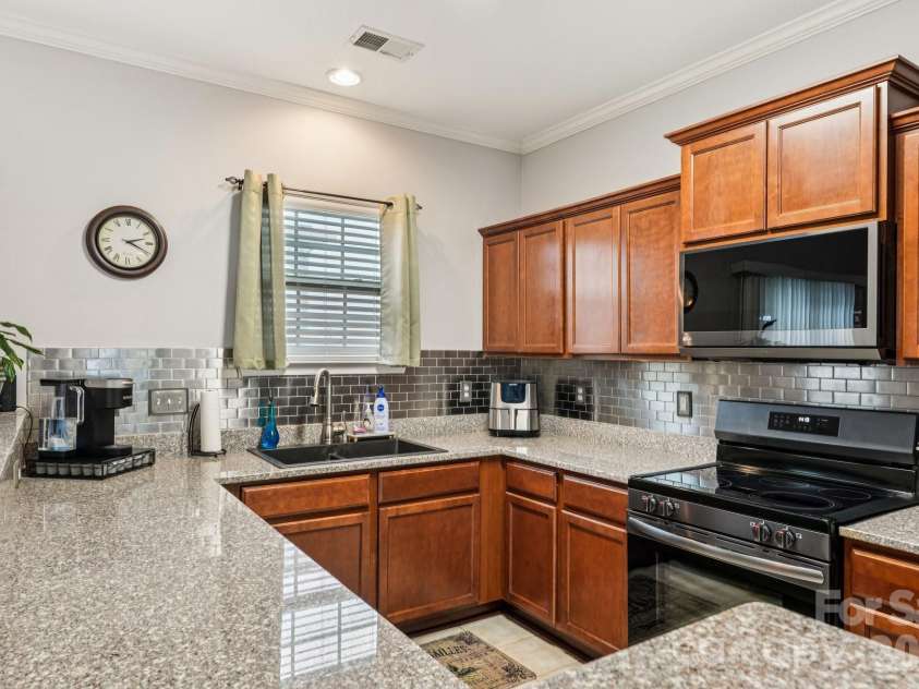 209 Halton Crossing Drive, Concord, NC 28027.  MLS# CAR4339937, YatesRealty ID 11702. 