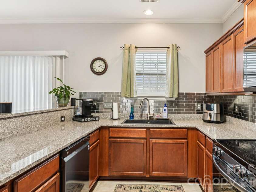 209 Halton Crossing Drive, Concord, NC 28027.  MLS# CAR4339937, YatesRealty ID 11702. 