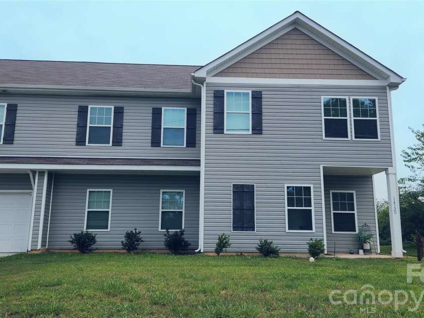 14727 Choate Circle, Charlotte, NC 28273.  MLS# CAR4287456, YatesRealty ID 11703. 14320 Moss, with garage on back