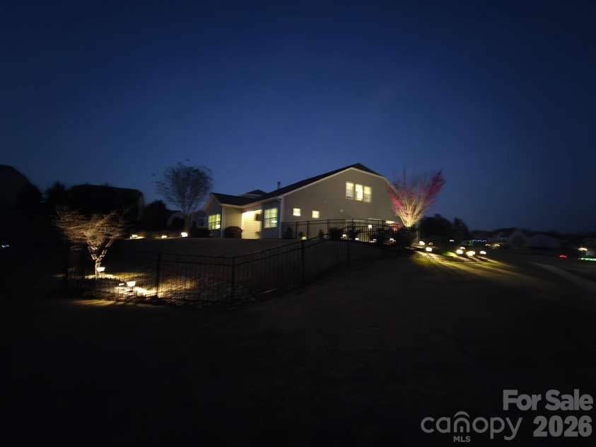 2003 Harvest Time Lane, Waxhaw, NC 28173.  MLS# CAR4361506, YatesRealty ID 11704. Beautiful landscape lighting