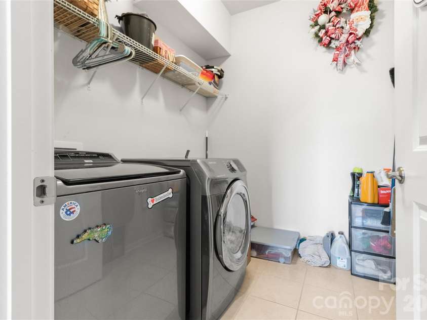 2003 Harvest Time Lane, Waxhaw, NC 28173.  MLS# CAR4361506, YatesRealty ID 11704. Laundry room on main level