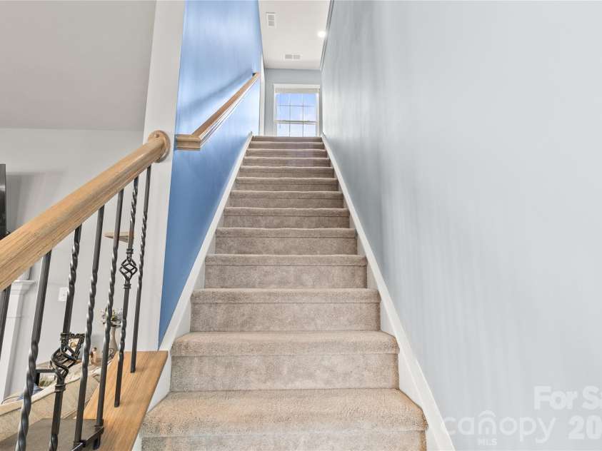2003 Harvest Time Lane, Waxhaw, NC 28173.  MLS# CAR4361506, YatesRealty ID 11704. Stairway to second level