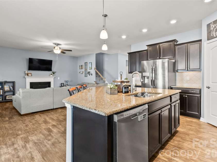2003 Harvest Time Lane, Waxhaw, NC 28173.  MLS# CAR4361506, YatesRealty ID 11704. View from kitchen into great room