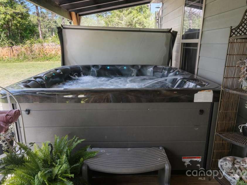 4107 Sandy Plains Road, Tryon, NC 28782.  MLS# CAR4250079, YatesRealty ID 11706. Hot Tub