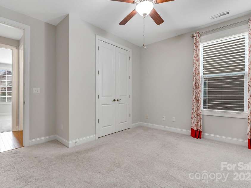 8210 Festival Way, Charlotte, NC 28215.  MLS# CAR4324351, YatesRealty ID 11707. A second comfortable guest room, ready for visitors.