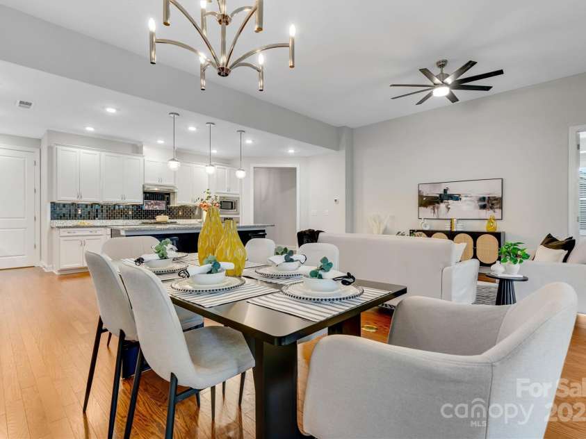 8210 Festival Way, Charlotte, NC 28215.  MLS# CAR4324351, YatesRealty ID 11707. Entertain, relax, repeat—this kitchen-dining-living layout makes it all effortless.