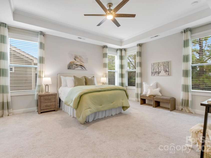 8210 Festival Way, Charlotte, NC 28215.  MLS# CAR4324351, YatesRealty ID 11707. The ultimate Primary Suite: style, function, and luxury at every turn.
