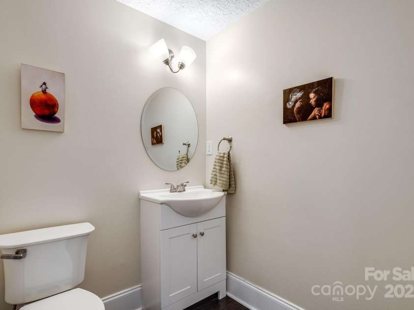 8 Quinn Court, Asheville, NC 28805.  MLS# CAR4255042, YatesRealty ID 11709. Main Floor Hall Half-Bath