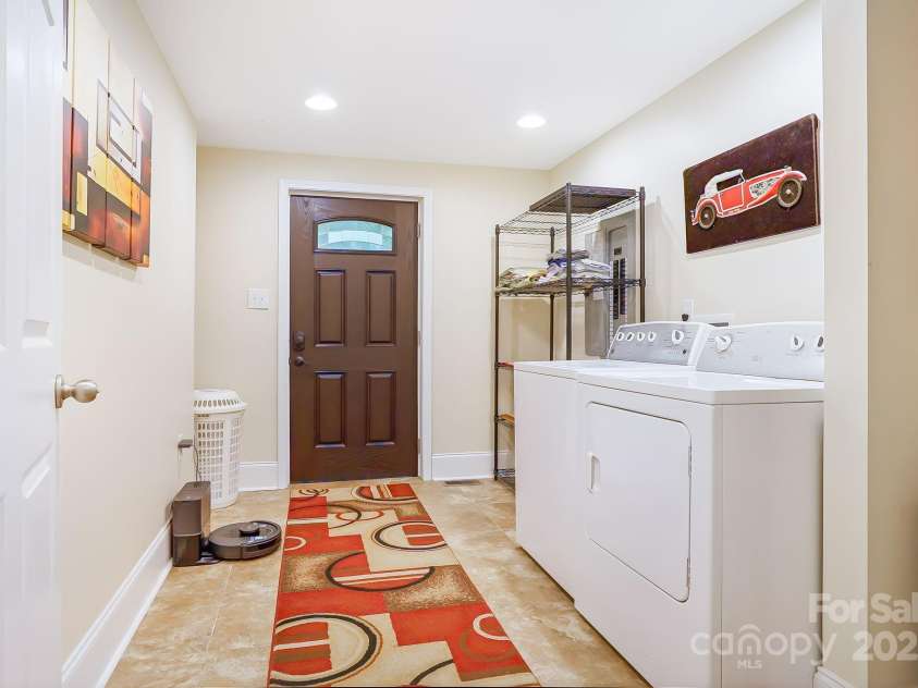 8 Quinn Court, Asheville, NC 28805.  MLS# CAR4255042, YatesRealty ID 11709. Oversized Laundry and Side Entrance