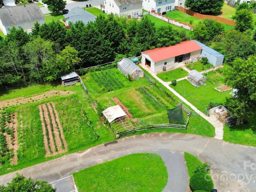 12708 Hamilton Road, Charlotte, NC 28273.  MLS# CAR4188404, YatesRealty ID 1171. Farm Field and Outbuildings