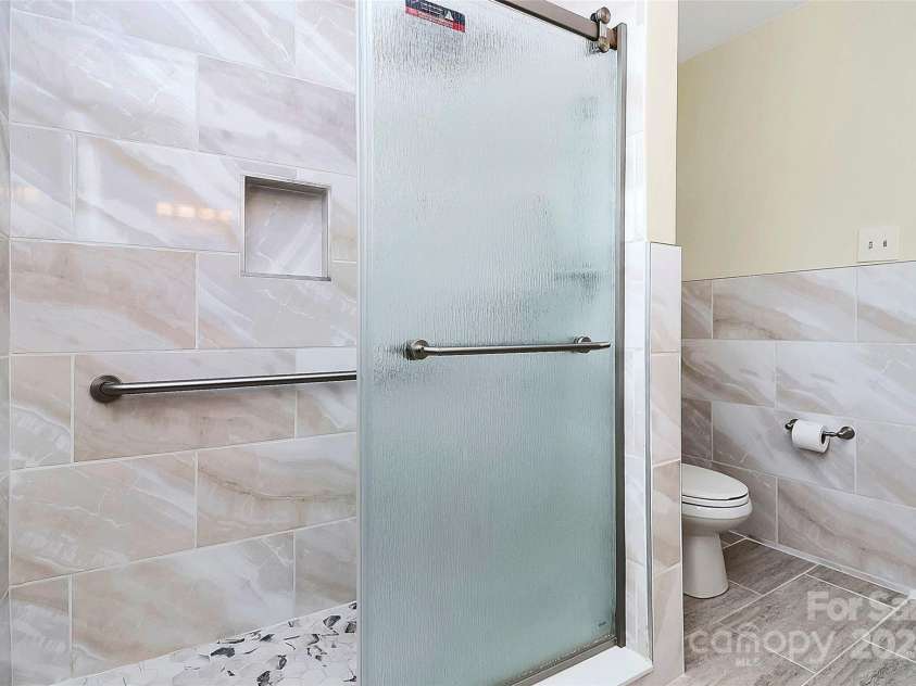 12708 Hamilton Road, Charlotte, NC 28273.  MLS# CAR4188404, YatesRealty ID 1171. Guest Bathroom