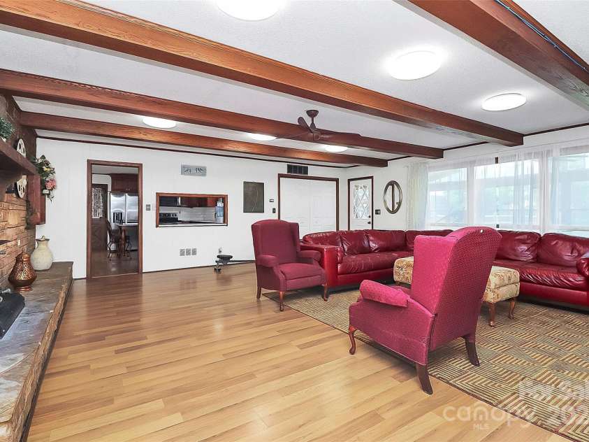 12708 Hamilton Road, Charlotte, NC 28273.  MLS# CAR4188404, YatesRealty ID 1171. Living Room off of Kitchen