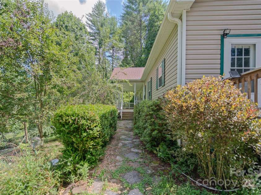 124 Wilds Branch Road, Marshall, NC 28753.  MLS# CAR4152556, YatesRealty ID 11710. Established landscaping