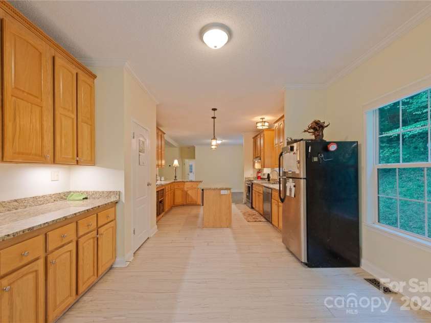 124 Wilds Branch Road, Marshall, NC 28753.  MLS# CAR4152556, YatesRealty ID 11710. So much kitchen storage!