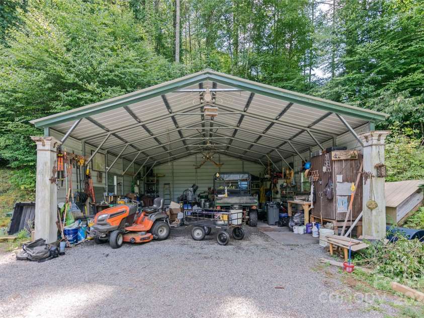 124 Wilds Branch Road, Marshall, NC 28753.  MLS# CAR4152556, YatesRealty ID 11710. Spacious metal barn ready for all your tools