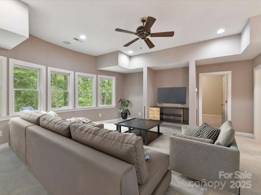3200 Delamere Drive, Matthews, NC 28104.  MLS# CAR4250146, YatesRealty ID 11722. VIRTUALLY STAGED BASEMENT REC Area