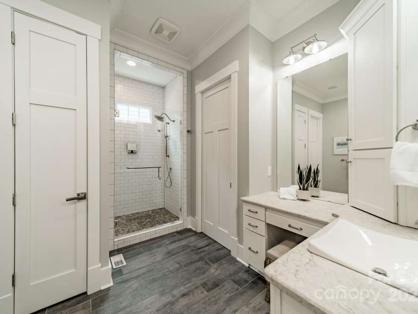 365 Delburg Street, Davidson, NC 28036.  MLS# CAR4248502, YatesRealty ID 11723. Primary bathroom with large walk-in closet