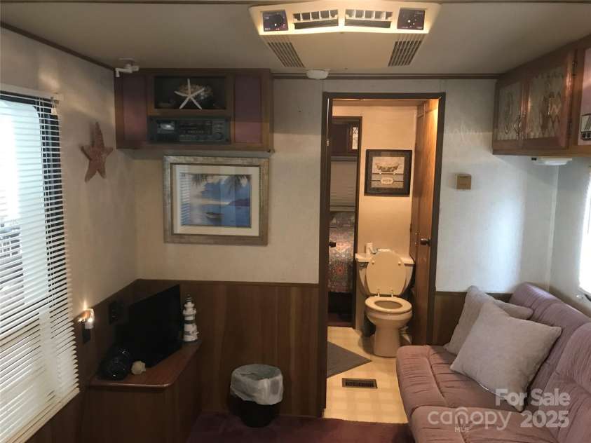 135/137 Indian Harbor Trail, Mount Gilead, NC 27306.  MLS# CAR4211628, YatesRealty ID 1173. 