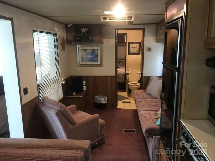 135/137 Indian Harbor Trail, Mount Gilead, NC 27306.  MLS# CAR4211628, YatesRealty ID 1173. 