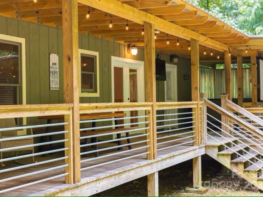 21 Sassafras Drive, Bryson City, NC 28713.  MLS# CAR4257168, YatesRealty ID 11732. Covered Back Porch
