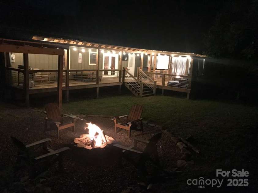 21 Sassafras Drive, Bryson City, NC 28713.  MLS# CAR4257168, YatesRealty ID 11732. Fire Pit at Night