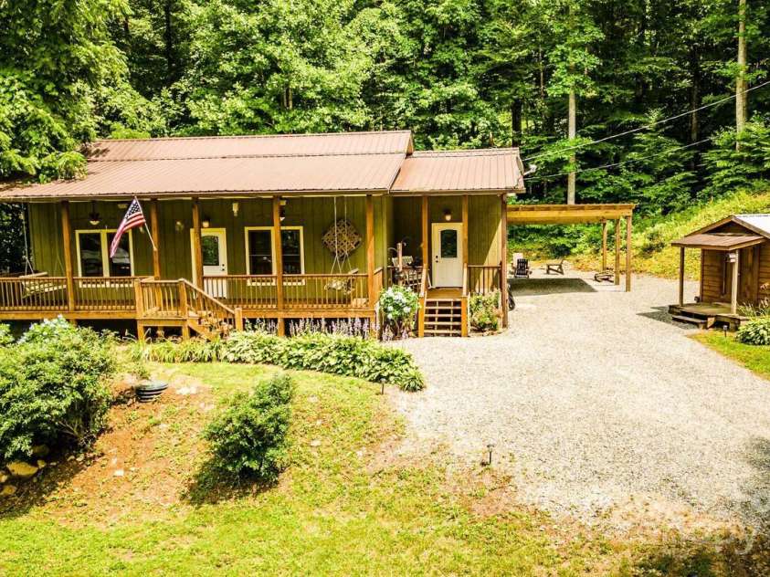 21 Sassafras Drive, Bryson City, NC 28713.  MLS# CAR4257168, YatesRealty ID 11732. Front of Home and Small Storage Shed