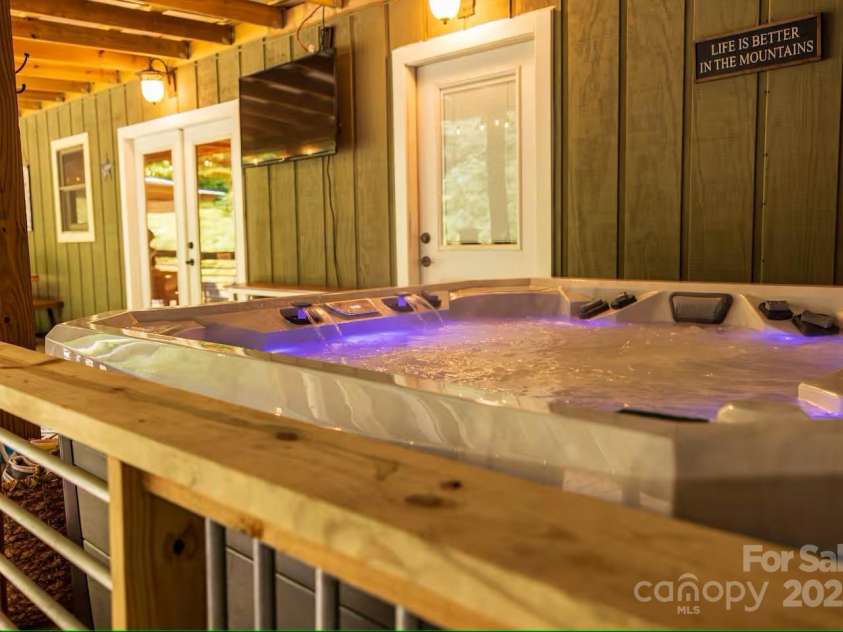 21 Sassafras Drive, Bryson City, NC 28713.  MLS# CAR4257168, YatesRealty ID 11732. Hot Tub on Back Deck