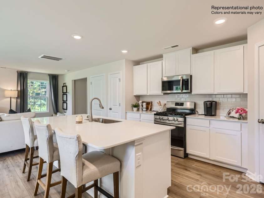 143 Spotted Way, Troutman, NC 28166.  MLS# CAR4370337, YatesRealty ID 11733. Kitchen