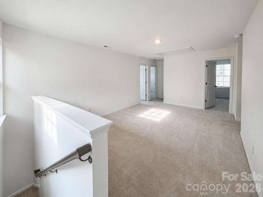 143 Spotted Way, Troutman, NC 28166.  MLS# CAR4370337, YatesRealty ID 11733. Loft great for entertaining