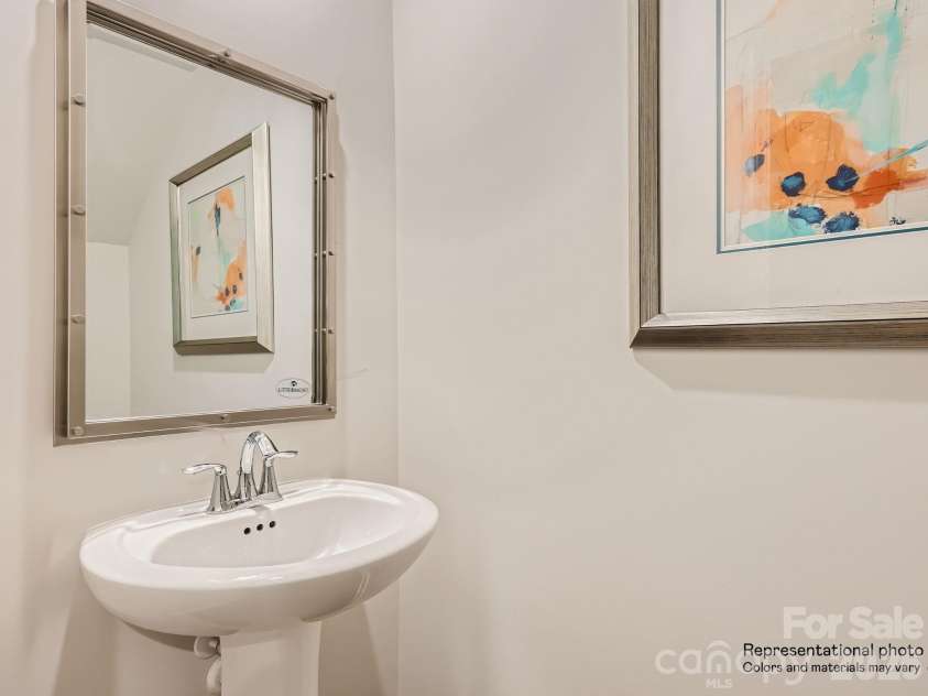 143 Spotted Way, Troutman, NC 28166.  MLS# CAR4370337, YatesRealty ID 11733. Powder Room