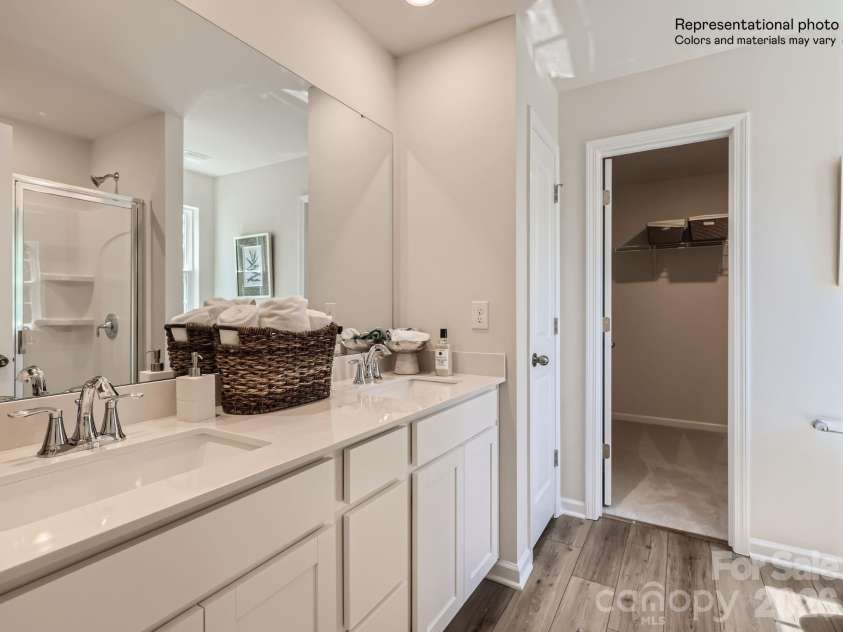 143 Spotted Way, Troutman, NC 28166.  MLS# CAR4370337, YatesRealty ID 11733. Primary Bathroom