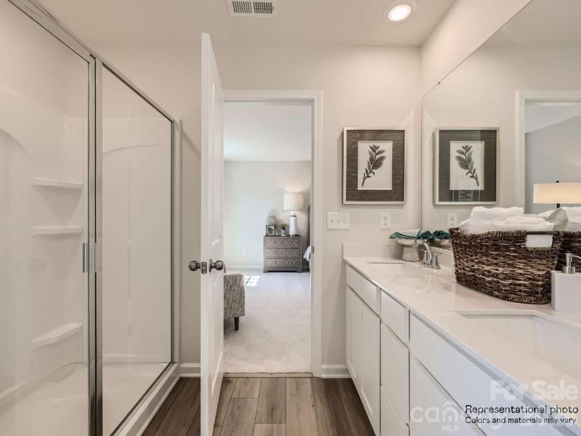 143 Spotted Way, Troutman, NC 28166.  MLS# CAR4370337, YatesRealty ID 11733. Primary Bathroom