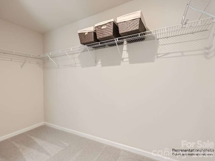 143 Spotted Way, Troutman, NC 28166.  MLS# CAR4370337, YatesRealty ID 11733. Primary Closet