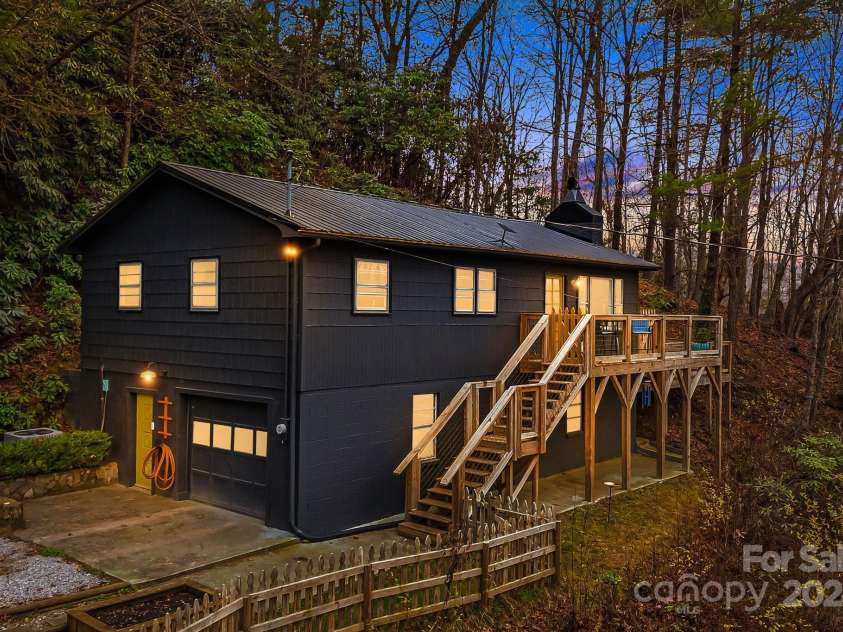 316 Rules Run Road, Clyde, NC 28721.  MLS# CAR4204518, YatesRealty ID 11733. Evening photo