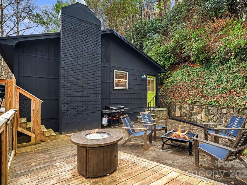316 Rules Run Road, Clyde, NC 28721.  MLS# CAR4204518, YatesRealty ID 11733. Firepit and deck area