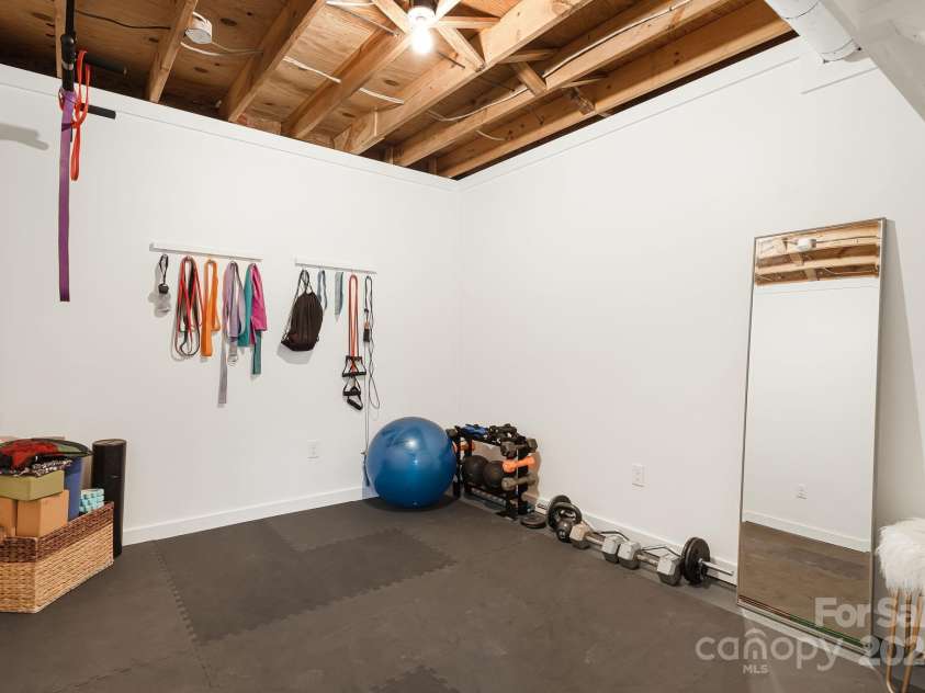 316 Rules Run Road, Clyde, NC 28721.  MLS# CAR4204518, YatesRealty ID 11733. Rec room