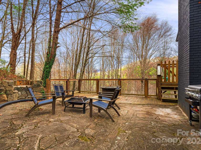 316 Rules Run Road, Clyde, NC 28721.  MLS# CAR4204518, YatesRealty ID 11733. Stone porch